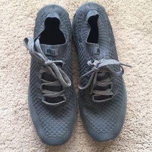 Grey and gum Nobull runners.